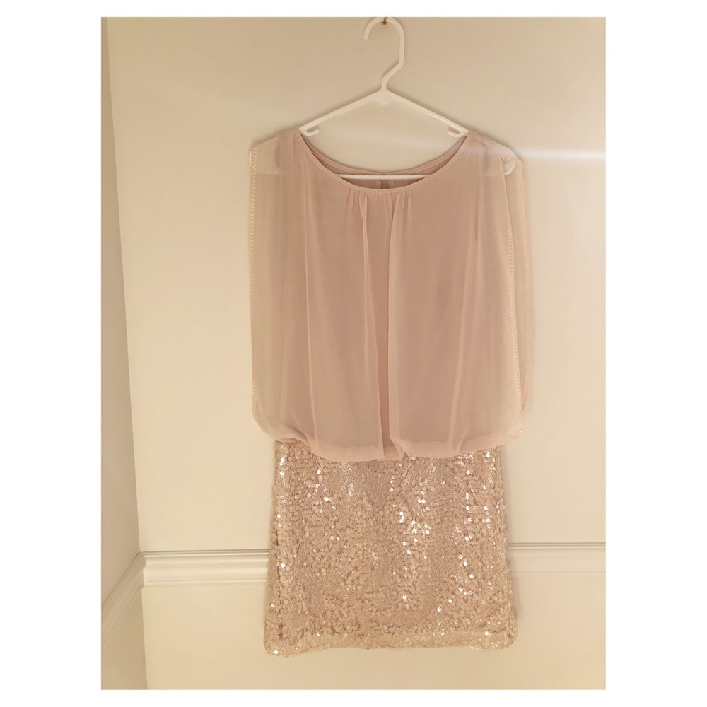 Beautiful dress and very classy. Used it once.